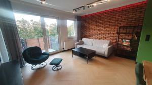 Posezení v ubytování Apartament LOFT