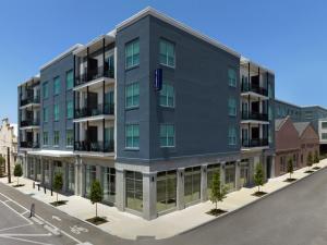 eine künstlerische Darstellung des geplanten Gebäudes an der Ecke einer Straße in der Unterkunft Hampton Inn New Orleans French Quarter Market Area in New Orleans