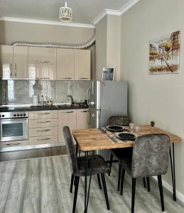 Kuchyň nebo kuchyňský kout v ubytování Soffi Apartament