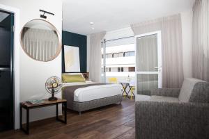 Katil atau katil-katil dalam bilik di Dizengoff square boutique - aparthotel