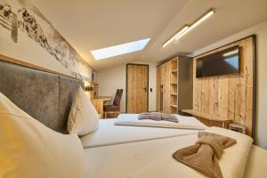 Voodi või voodid majutusasutuse Eibinghof BED & BREAKFAST & SWIM toas