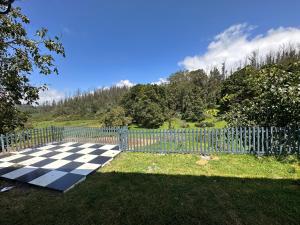 Um jardim no exterior de RR Forest View