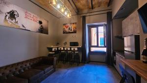 TV a/nebo společenská místnost v ubytování vatican street art