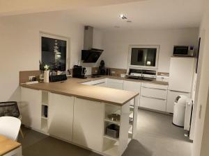 Kuchyň nebo kuchyňský kout v ubytování Holiday home Berghouse Elleringhausen