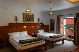 Voodi või voodid majutusasutuse Hotel La Posada de Atahualpa toas