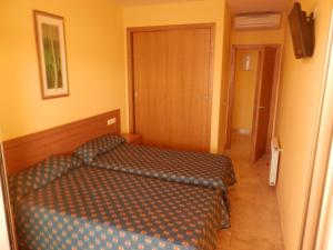 Postel nebo postele na pokoji v ubytování Paraiso Lido-Fincas Benidorm