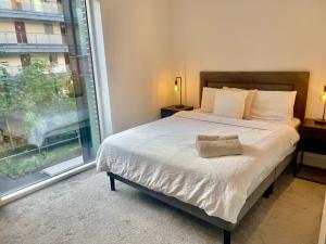 Ένα ή περισσότερα κρεβάτια σε δωμάτιο στο Modern Ensuite Double Bedroom +25 φωτογραφίες