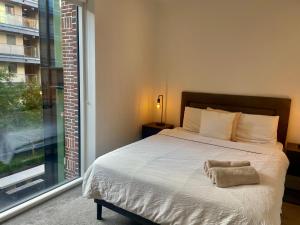 Ένα ή περισσότερα κρεβάτια σε δωμάτιο στο Modern Ensuite Double Bedroom