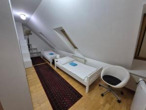Postel nebo postele na pokoji v ubytování Vienna Rooms Nr 15
