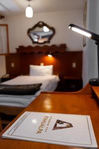 Postel nebo postele na pokoji v ubytování Hotel La Posada de Atahualpa