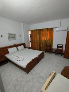 Postel nebo postele na pokoji v ubytování Sara Hotel Aswan