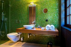 Koupelna v ubytování Hotel Krone Regensberg + 37 fotografií