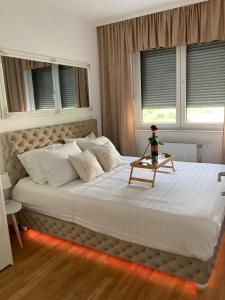 Postel nebo postele na pokoji v ubytování Apartman 10 Lux