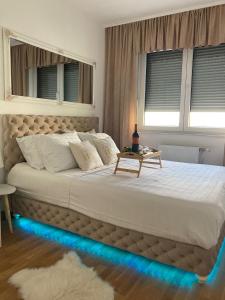 Postel nebo postele na pokoji v ubytování Apartman 10 Lux