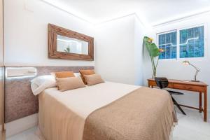 A bed or beds in a room at Vivendos - TR17 - Roca Chica