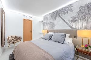A bed or beds in a room at Vivendos - TR17 - Roca Chica