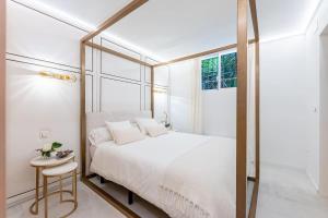 A bed or beds in a room at Vivendos - TR17 - Roca Chica