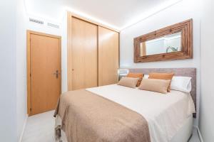 A bed or beds in a room at Vivendos - TR17 - Roca Chica
