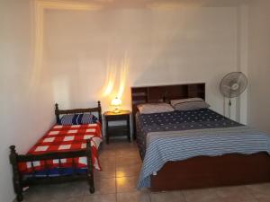 En eller flere senge i et værelse på DEPTOS VM