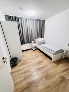 Postel nebo postele na pokoji v ubytování Zimmervermietung Rochlitz