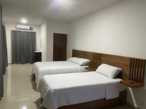 Postel nebo postele na pokoji v ubytování Hotel Alto Cielo + 8 fotografií