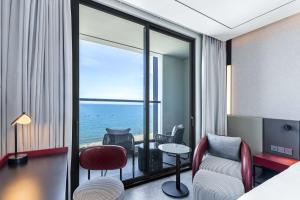 A seating area at Radisson RED Danang