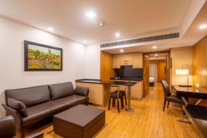 A television and/or entertainment centre at Svelte Delhi, a member of Radisson Individuals