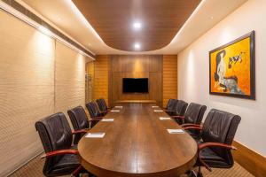 A television and/or entertainment centre at Svelte Delhi, a member of Radisson Individuals