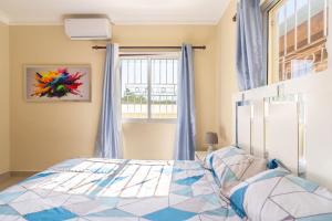 Postel nebo postele na pokoji v ubytování Sky Blue + 20 fotografií