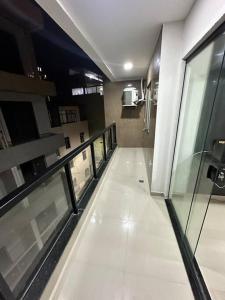 a view of a hallway in a building at Apto 2 quartos perto da praia in Rio de Janeiro