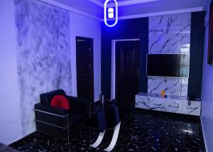 TV o dispositivi per l'intrattenimento presso Skyrock Hotels Ikeja