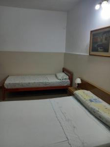Postel nebo postele na pokoji v ubytování Hotel Florentino + 7 fotografií