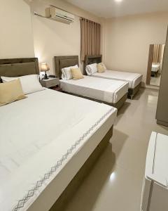 Ένα ή περισσότερα κρεβάτια σε δωμάτιο στο Darling Hotel Ciudad del Este