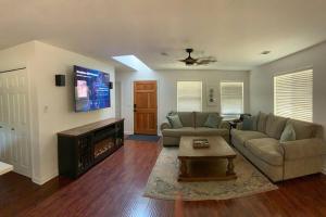 a living room with a couch and a fireplace at Walnut Grove 2BD 1Bath in Oakhurst