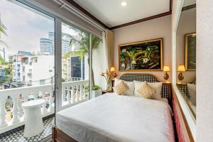 Katil atau katil-katil dalam bilik di White Lotus - Heritage Hotel