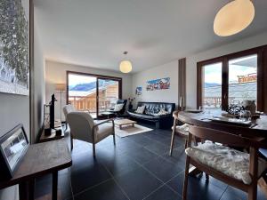 Posezení v ubytování Appartement lumineux 2 chambres avec terrasse et garage privé à Briançon - FR-1-330C-144