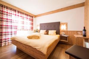Postel nebo postele na pokoji v ubytování Gästehaus Falkner Ignaz
