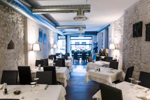 Reštaurácia alebo iné gastronomické zariadenie v ubytovaní Locanda al Vescovo & SPA