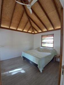 Postel nebo postele na pokoji v ubytování NAHIKI Lodge