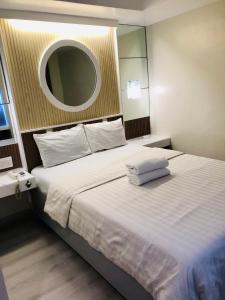 Postel nebo postele na pokoji v ubytování PARADISE HOTEL