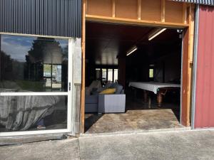 Φωτογραφία από το άλμπουμ του Self contained open shed space σε Wainui