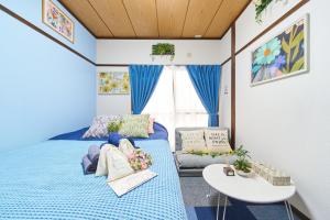 Una cama o camas en una habitación de Belmont 102 3min to Station Easy Access Ueno Asakusa Skytree Sleeps 5