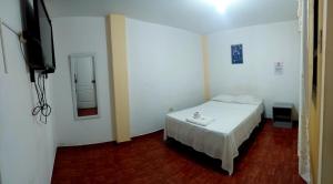 En eller flere senge i et værelse på ElOlympo