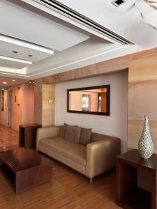 Posezení v ubytování Studio One Condominium, Alabang - Bluu - Fiber Wi-Fi, Netflix-ready