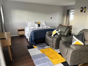 Postel nebo postele na pokoji v ubytování Windsor Motel