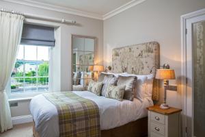 מיטה או מיטות בחדר ב-Foyles of Glasbury