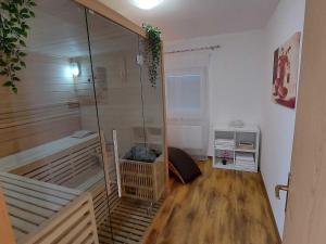 a small bathroom with a shower in a room at Holiday Home Gra ec - Three Bedroom Holiday Home with swimming pool in Zagreb +17 photos