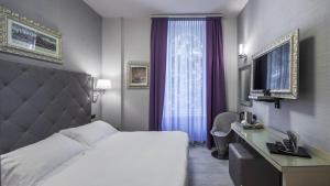 TV a/nebo společenská místnost v ubytování Hotel Moderno