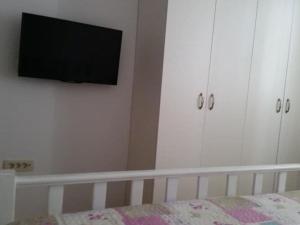 Ένα ή περισσότερα κρεβάτια σε δωμάτιο στο Apartments Villa Rustica ST - Two-Bedroom Apartment with Balcony and Shared Pool 1 kat +3 φωτογραφίες