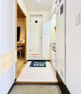 Cuina o zona de cuina de 201号室花園町,萩之茶屋駅步行2分専用バスルームアクセス便利